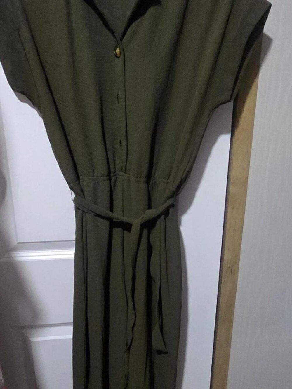 Green romper with tie waist and button up front. Size: S#dressy #formal